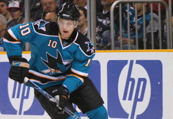 SAN JOSE, CA - JANUARY 13:  Christian Ehrhoff #10 of the San Jose Sharks skates with the puck against the Tampa Bay Lightning during the NHL game on January 13, 2009 at the HP Pavilion in San Jose, California.  (Photo by Bruce Bennett/Getty Images)