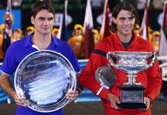 MELBOURNE, AUSTRALIA - FEBRUARY 01:  Roger Federer of Switzerland and Rafael Nadal of Spain pose with their trophies after the men's final match during day fourteen of the 2009 Australian Open at Melbourne Park on  February 1, 2009 in Melbourne, Australia.  (Photo by Clive Brunskill/Getty Images)