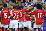 Thomas Vermaelen of Arsenal is congratulated by teammates after scoring his teams second goal during the Barclays Premier League match between Everton and Arsenal at Goodison Park on August 15, 2009 in Liverpool, England. (Photo by Michael Regan/Getty Images)