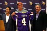 EDEN PRAIRIE, MN - AUGUST 18: Brett Favre (C), Mark Wilf (L) and Zygi Wilf show the media Favre's Minnesota Vikings jersey on August 18, 2009 at Winter Park in Eden Prairie, Minnesota. (Photo by Scott A. Schneider/Getty Images)