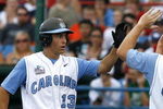 OMAHA, NE - JUNE 21:  First baseman Dustin Ackley #13 of the North Carolina Tar Heels celebrates with teammates after hitting a solo homer in the second inning to the give the Tar Heels a 1-0 lead over the Rice Owls in Game 13 of the NCAA College World Series at Rosenblatt Stadium on June 21, 2007 in Omaha, Nebraska. (Photo by Kevin C. Cox/Getty Images) 