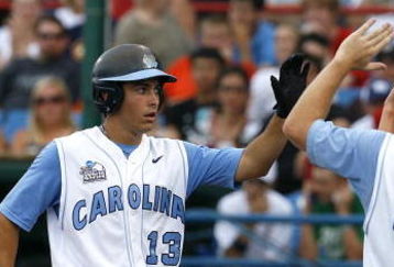 OMAHA, NE - JUNE 21:  First baseman Dustin Ackley #13 of the North Carolina Tar Heels celebrates with teammates after hitting a solo homer in the second inning to the give the Tar Heels a 1-0 lead over the Rice Owls in Game 13 of the NCAA College World Series at Rosenblatt Stadium on June 21, 2007 in Omaha, Nebraska. (Photo by Kevin C. Cox/Getty Images) 