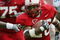 RALEIGH, NC - SEPTEMBER 27:  Tailback Josh Brown #26 of the North Carolina State University Wolfpack carries the ball against the University of North Carolina Tar Heels during the game at Carter Finley Stadium on September 27, 2003 in Raleigh, North Carolina.  N.C. State defeated UNC 47-34.  (Photo by Craig Jones/Getty Images)