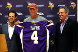 EDEN PRAIRIE, MN - AUGUST 18: Brett Favre (C), Mark Wilf (L) and Zygi Wilf show the media Favre's Minnesota Vikings jersey on August 18, 2009 at Winter Park in Eden Prairie, Minnesota. (Photo by Scott A. Schneider/Getty Images)