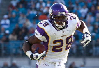 JACKSONVILLE, FL - NOVEMBER 23:  Adrian Peterson #28 of the Minnesota Vikings runs for yardage against the Jacksonville Jaguars during the game at Jacksonville Municipal stadium on November 23, 2008 in Jacksonville, Florida.  (Photo by Sam Greenwood/Getty Images)