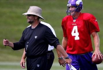 EDEN PRAIRIE, MN - AUGUST 18:  Minnesota Vikings Head Coach Brad Childress (L) walks with Brett Favre #4 after finishing  a passing drill during a Minnesota Vikings practice session on August 18, 2009 at Winter Park in Eden Prairie, Minnesota. Favre has reportedly agreed to play for the Vikings, a reversal of his announced retirement.  (Photo by Scott A. Schneider/Getty Images)