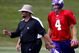 EDEN PRAIRIE, MN - AUGUST 18: Minnesota Vikings Head Coach Brad Childress (L) walks with Brett Favre #4 after finishing a passing drill during a Minnesota Vikings practice session on August 18, 2009 at Winter Park in Eden Prairie, Minnesota. Favre has reportedly agreed to play for the Vikings, a reversal of his announced retirement. (Photo by Scott A. Schneider/Getty Images)
