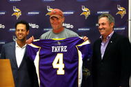 EDEN PRAIRIE, MN - AUGUST 18: Brett Favre (C), Mark Wilf (L) and Zygi Wilf show the media Favre's Minnesota Vikings jersey on August 18, 2009 at Winter Park in Eden Prairie, Minnesota. (Photo by Scott A. Schneider/Getty Images)