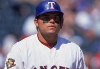 20 May 2001:  Ivan Rodriguez #7 of the Texas Rangers walks up to bat during the game against the Toronto Blue Jays at The Ballpark in Arlington, Texas.  The Rangers defeated the Blue Jays 3-2.Mandatory Credit: Ronald Martinez  /Allsport
