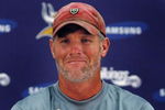 EDEN PRAIRIE, MN - AUGUST 18: Brett Favre talks with the media after his first practice with the Minnesota Vikings on August 18, 2009 at Winter Park in Eden Prairie, Minnesota.  (Photo by Scott A. Schneider/Getty Images)