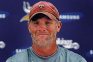 EDEN PRAIRIE, MN - AUGUST 18: Brett Favre talks with the media after his first practice with the Minnesota Vikings on August 18, 2009 at Winter Park in Eden Prairie, Minnesota.  (Photo by Scott A. Schneider/Getty Images)