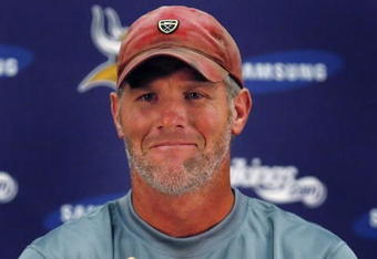 EDEN PRAIRIE, MN - AUGUST 18: Brett Favre talks with the media after his first practice with the Minnesota Vikings on August 18, 2009 at Winter Park in Eden Prairie, Minnesota.  (Photo by Scott A. Schneider/Getty Images)