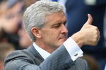 BLACKBURN, ENGLAND - AUGUST 15:  Manchester City Manager Mark Hughes gives a thumbs up and a wink  prior to the Barclays Premier League match between Blackburn Rovers and Manchester City at Ewood Park on August 15, 2009 in Blackburn, England. (Photo by Alex Livesey/Getty Images)
