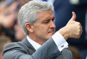 BLACKBURN, ENGLAND - AUGUST 15:  Manchester City Manager Mark Hughes gives a thumbs up and a wink  prior to the Barclays Premier League match between Blackburn Rovers and Manchester City at Ewood Park on August 15, 2009 in Blackburn, England. (Photo by Alex Livesey/Getty Images)