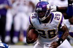 INDIANAPOLIS, IN - AUGUST 14: Running back Adrian Peterson #28 of the Minnesota Vikings runs with the football against the Indianapolis Colts at Lucas Oil Stadium on August 14, 2009 in Indianapolis, Indiana. (Photo by Scott Boehm/Getty Images)