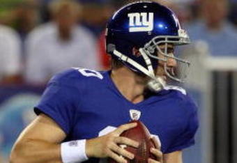 EAST RUTHERFORD, NJ - AUGUST 17:  Eli Manning #10 of the New York Giants looks to pass against the Carolina Panthers on August 17, 2009 at Giants Stadium in East Rutherford, New Jersey. The Giants defeated the Panthers 24-17.  (Photo by Jim McIsaac/Getty Images)