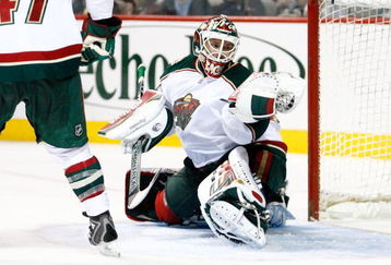 MONTREAL- OCTOBER 4:  Niklas Backstrom #32 of the Minnesota Wild makes a glove save during the game against the Montreal Canadiens at the Bell Centre on October 04, 2008 in Montreal, Quebec, Canada.  The Wild defeated the Canadiens 3-0.   (Photo by Richard Wolowicz/Getty Images)