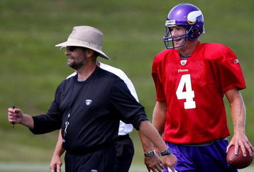 EDEN PRAIRIE, MN - AUGUST 18:  Minnesota Vikings Head Coach Brad Childress (L) walks with Brett Favre #4 after finishing  a passing drill during a Minnesota Vikings practice session on August 18, 2009 at Winter Park in Eden Prairie, Minnesota. Favre has reportedly agreed to play for the Vikings, a reversal of his announced retirement.  (Photo by Scott A. Schneider/Getty Images)