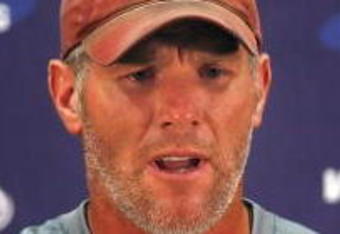 EDEN PRAIRIE, MN - AUGUST 18: Brett Favre talks with the media after his first practice with the Minnesota Vikings on August 18, 2009 at Winter Park in Eden Prairie, Minnesota.  (Photo by Scott A. Schneider/Getty Images)