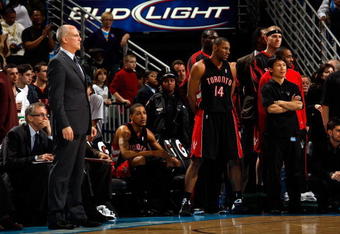 NEW ORLEANS - FEBRUARY 06:  Head coach Jay Triano of the Toronto Raptors watches the final minutes of the game agaainst the New Orleans Hornets on February 6, 2009 in New Orleans, Louisiana.  NOTE TO USER: User expressly acknowledges and agrees that, by downloading and/or using this Photograph, user is consenting to the terms and conditions of the Getty Images License Agreement.  (Photo by Chris Graythen/Getty Images)