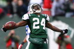 EAST RUTHERFORD, NJ - DECEMBER 14:  Darrelle Revis #24 of the New York Jets celebrates making a game saving interception in the closing minutes of regulation preserving a 31-27 win against the Buffalo Bills during their game on December 14, 2008 at Giants Stadium in East Rutherford, New Jersey.  (Photo by Al Bello/Getty Images)