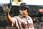 PHOENIX - JUNE 14:  Ivan Rodriguez #12 of the Houston Astros congratulates teammate Miguel Tejada (not pictured) after Tejada scored on a sacrafice fly hit by Rodriguez during the sixth inning of the major league baseball game against the Arizona Diamondbacks at Chase Field on June 14, 2009 in Phoenix, Arizona. The Astros defeated the Diamondbacks 8-3.  (Photo by Christian Petersen/Getty Images)