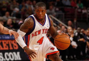 NEW YORK - MARCH 07:  Nate Robinson #4 of the New York Knicks dribbles the ball against the Charlotte Bobcats on March 7, 2009 at Madison Square Garden in New York City. NOTE TO USER: User expressly acknowledges and agrees that, by downloading and or using this photograph, User is consenting to the terms and conditions of the Getty Images License Agreement.  (Photo by Nick Laham/Getty Images)