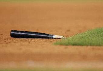 NEW YORK - AUGUST 10: The broken bat of Jose Bautista #23 of the Toronto Blue Jays lays in the infield during the game on August 10, 2009 at Yankee Stadium in the Bronx borough of New York City. (Photo by Jared Wickerham/Getty Images)