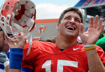 GAINESVILLE, FL - APRIL 18: Quarterback Tim Tebow #15 of the University of Florida celebrates after the spring football orange and blue game April 18, 2009 at Ben Hill Griffin Stadium in Gainesville, Florida.  (Photo by Al Messerschmidt/Getty Images)