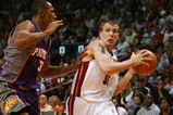 MIAMI - NOVEMBER 09:  Boris Diaw #3 of the Phoenix Suns tries to slow down Jason Williams #55 of the Miami Heat at American Airlines Arena on November 9,  2007 in Miami, Florida. The Suns defeated the Heat 106-101. NOTE TO USER: User expressly acknowledges and agrees that, by downloading and or using this photograph, User is consenting to the terms and conditions of the Getty Images License Agreement.  (Photo by Doug Benc/Getty Images)
