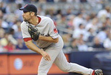 NEW YORK - AUGUST 06: John Smotlz #29 of the Boston Red Sox throws a pitch in the first inning of the AL baseball game against the New York Yankees at Yankee Stadium on August 6, 2009 in New York, New York.  (Photo by Paul Bereswill/Getty Images)