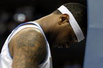 DENVER - MAY 23:  Carmelo Anthony #15 of the Denver Nuggets reacts late in the fourth quarter against the Los Angeles Lakers in Game Three of the Western Conference Finals during the 2009 NBA Playoffs at Staples Center on May 23, 2009 in Denver, Colorado. NOTE TO USER: User expressly acknowledges and agrees that, by downloading and or using this photograph, User is consenting to the terms and conditions of the Getty Images License Agreement.  (Photo by Jed Jacobsohn/Getty Images)