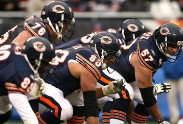 CHICAGO - NOVEMBER 09:  Olin Kreutz #57 of the Chicago Bears centers the ball at the line of scrimmage against the Tennessee Titans at Soldier Field on November 9, 2008 in Chicago, Illinois. The Titans won 21-14. (Photo by Jonathan Ferrey/Getty Images)