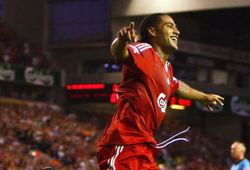 LIVERPOOL, ENGLAND - AUGUST 19:  Glen Johnson of Liverpool celebrates scoring his team's second goal during the Barclays Premier League match between Liverpool and Stoke City at Anfield on August 19, 2009 in Liverpool, England.  (Photo by Clive Brunskill/Getty Images)