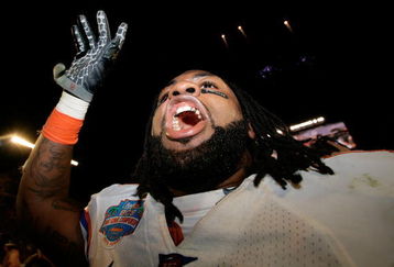 MIAMI - JANUARY 08:  Brandon Spikes #51 of the Florida Gators celebrate after defeating the Oklahoma Sooners in the FedEx BCS National Championship Game at Dolphin Stadium on January 8, 2009 in Miami, Florida. The Gators won the game by a score of 24-14.  (Photo by Eliot J. Schechter/Getty Images)