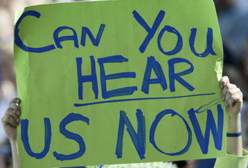 SEATTLE - SEPTEMBER 24:  A Seattle Seahawks fan displays a sign referring to noise during a game against the New York Giants at Qwest Field September 24, 2006 in Seattle, Washington. The Seahawks won, 42-30.  (Photo by Otto Greule Jr/Getty Images)