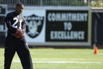 NAPA, CA - AUGUST 05:  Nnamdi Asomugha #21 looks on during the Oakland Raiders Training Camp at the Napa Valley Marriott on August 5, 2009 in Napa, California.  (Photo by Jed Jacobsohn/Getty Images)