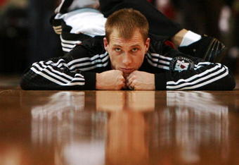 MIAMI - NOVEMBER 21:  Jason Williams #55 of the Miami Heat stretches before taking on the Atlanta Hawks at American Airlines Arena on November 21,  2007 in Miami, Florida.  NOTE TO USER: User expressly acknowledges and agrees that, by downloading and or using this photograph, User is consenting to the terms and conditions of the Getty Images License Agreement.  (Photo by Doug Benc/Getty Images)