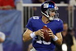 EAST RUTHERFORD, NJ - AUGUST 17:  Eli Manning #10 of the New York Giants looks to pass against the Carolina Panthers on August 17, 2009 at Giants Stadium in East Rutherford, New Jersey. The Giants defeated the Panthers 24-17.  (Photo by Jim McIsaac/Getty Images)
