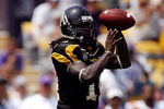 BATON ROUGE, LA - AUGUST 30:  Quarterback Armanti Edwards #14 of the Appalachian State Mountaineers looks to throw a pass against the Louisiana State University Tigers on August 30, 2008 at Tiger Stadium in Baton Rouge, Louisiana.  (Photo by Chris Graythen/Getty Images)