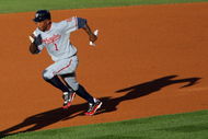 DENVER - JULY 06:  Nyjer Morgan #1 of the Washington Nationals steals second base against the Colorado Rockies in the third inning during MLB action at Coors Field on July 6, 2009 in Denver, Colorado. The Rockies defeated the Nationals 1-0.  (Photo by Doug Pensinger/Getty Images)