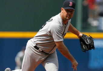 ATLANTA - JUNE 27:  Starting pitcher Tim Wakefield #49 of the Boston Red Sox against the Atlanta Braves at Turner Field on June 27, 2009 in Atlanta, Georgia.  (Photo by Kevin C. Cox/Getty Images)