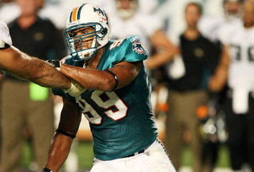MIAMI - AUGUST 17:  Defensive end Jason Taylor #99 of the Miami Dolphins fights off a block against the Jacksonville Jaguars during a preseason game at Landshark Stadium on August 17, 2009 in Miami, Florida.  (Photo by Doug Benc/Getty Images)