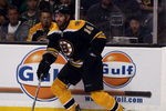 BOSTON - MAY 14:  Stephane Yelle #18 of the Boston Bruins takes the puck against the Carolina Hurricanes during Game Seven of the Eastern Conference Semifinal Round of the 2009 Stanley Cup Playoffs on May 14, 2009 at the TD Banknorth Garden in Boston, Massachusetts. The Hurricanes defeated the Bruins 3-2 in overtime.  (Photo by Elsa/Getty Images)