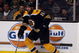 BOSTON - MAY 14:  Stephane Yelle #18 of the Boston Bruins takes the puck against the Carolina Hurricanes during Game Seven of the Eastern Conference Semifinal Round of the 2009 Stanley Cup Playoffs on May 14, 2009 at the TD Banknorth Garden in Boston, Massachusetts. The Hurricanes defeated the Bruins 3-2 in overtime.  (Photo by Elsa/Getty Images)