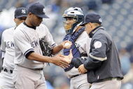 KANSAS CITY, MO - APRIL 12:  Damaso Marte #43 of the New York Yankees is relieved by manager Joe Girardi #27 against the Kansas City Royals on April 12, 2009 at Kauffman Stadium in Kansas City, Missouri. (Photo by G. Newman Lowrance/Getty Images)