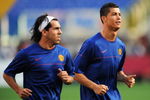 ROME - MAY 26:  Carlos Tevez and Cristiano Ronaldo of Manchester United run as they attend the Manchester United training session prior to UEFA Champions League Final versus Barcelona at the Stadio Olimpico on May 26, 2009 in Rome, Italy.  (Photo by Shaun Botterill/Getty Images)