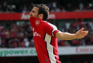 LONDON - APRIL 26:  Cesc Fabregas of Arsenal celebrates scoring the second goal during the Barclays Premier League match between Arsenal and Middlesbrough at Emirates Stadium on April 26, 2009 in London, England.  (Photo by Hamish Blair/Getty Images)