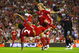 LIVERPOOL, ENGLAND - AUGUST 19: Glen Johnson (L) of Liverpool scores his team's second goal during the Barclays Premier League match between Liverpool and Stoke City at Anfield on August 19, 2009 in Liverpool, England. (Photo by Clive Brunskill/Getty Images)