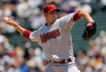 DENVER - JULY 22:  Starting pitcher John Garland #52 of the Arizona Diamondbacks delivers against the Colorado Rockies during MLB action at Coors Field on July 22, 2009 in Denver, Colorado.  (Photo by Doug Pensinger/Getty Images)